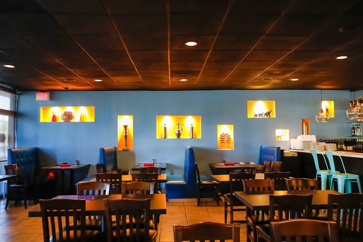 Dining room with blue booth seating